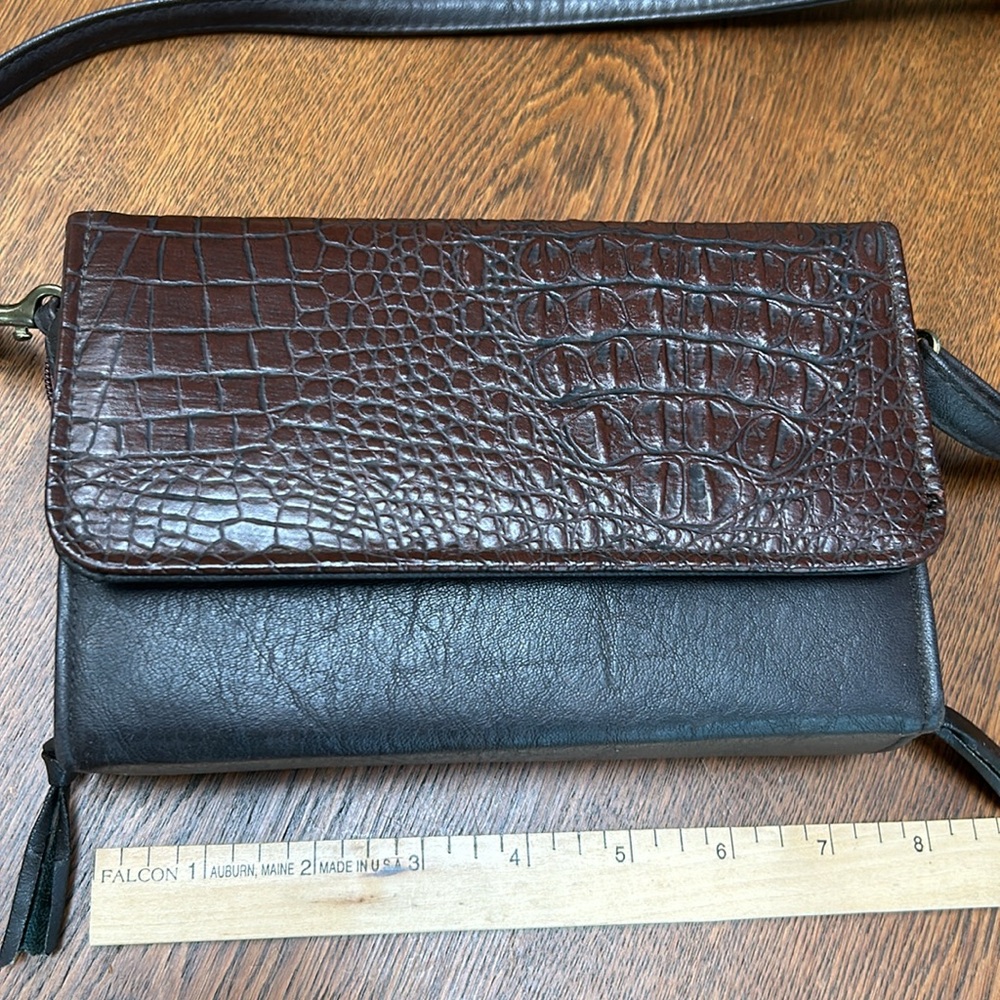 Kolta crossbody versatile compact bag. Brown croc-like embossed rectangle shape.